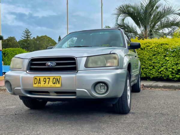 Sell use Subaru for cash - photo showing the front passenger side angle view of a used Subaru recently purchased from a customer at We Buy Sydney Cars depot in Botany