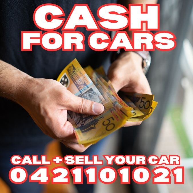 Photo shows a man counting cash as he has just sold his car to We Buy Sydney Cars